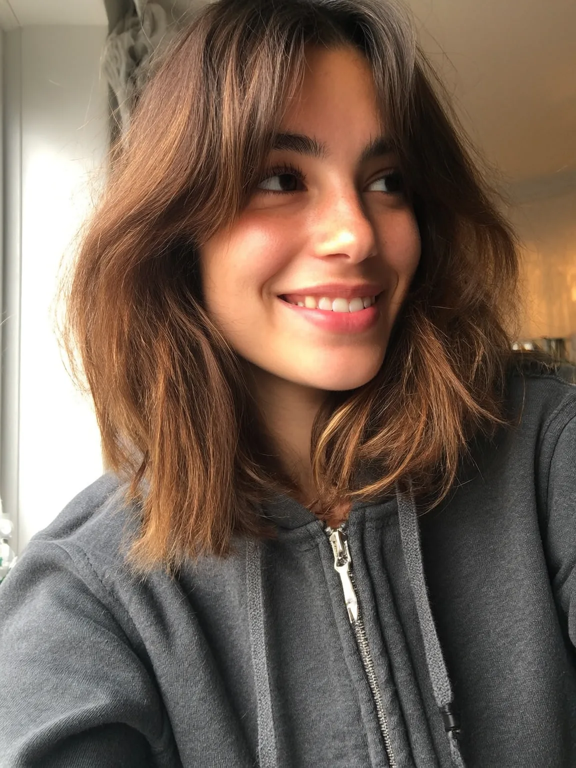 Wavy Layered Bob with Chestnut Curtain Bangs